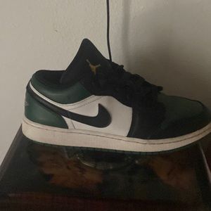 These match with black shorts and green and white shirt